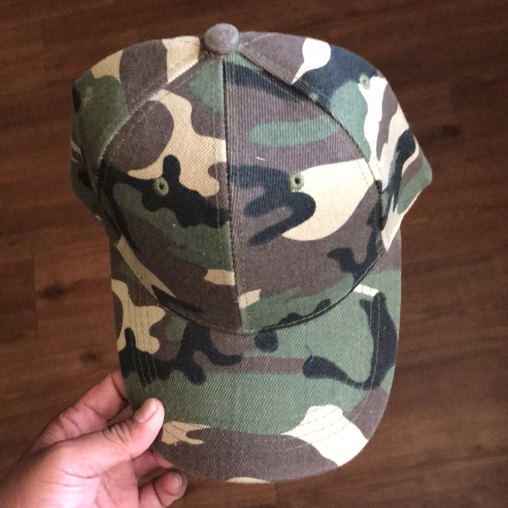 Brand new camo hat never worn, made in Bangladesh.